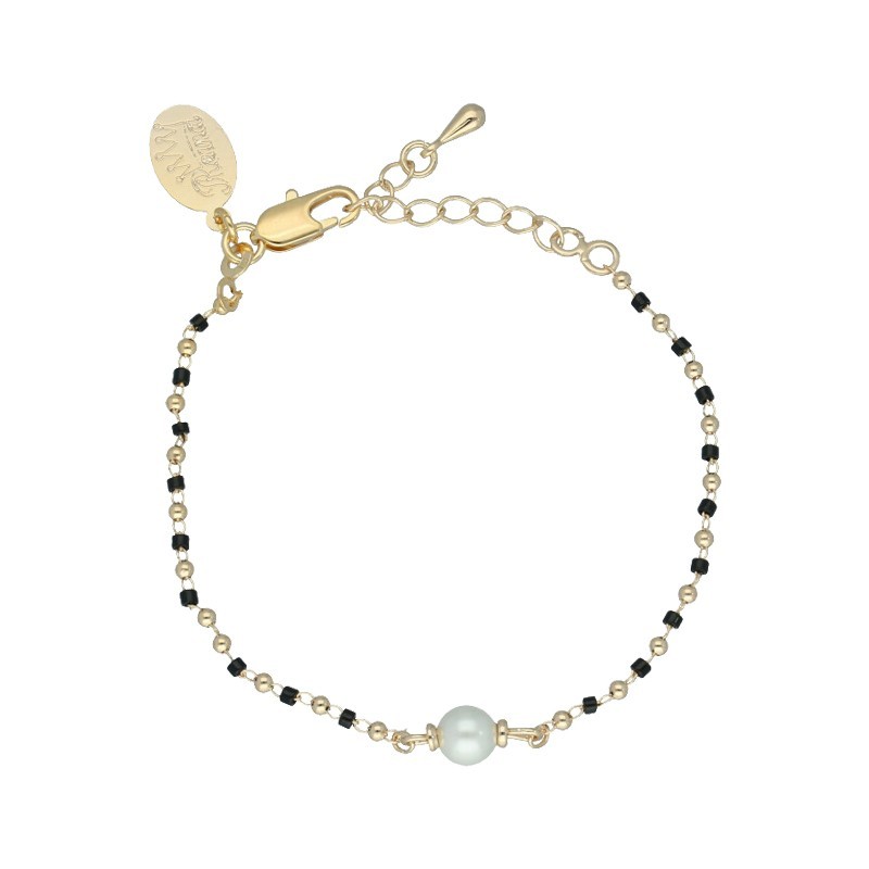 Pulsera piedras negras y perla centro chapada en oro (1micra)