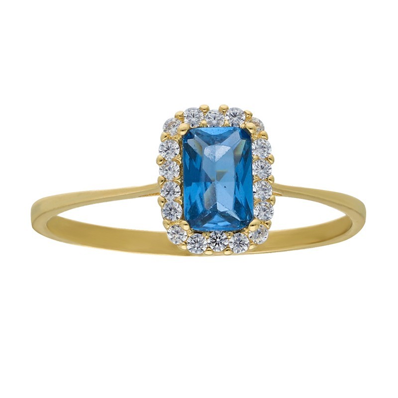 Anillo circonita azul central con pequeñas circonitas Oro 18 K